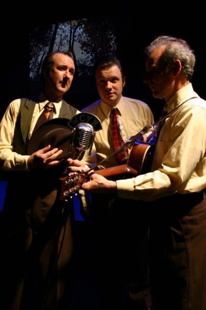Buddy Woodward as WCYB station manager with Brandon Storey and Ed Snodderly — Man of Constant Sorrow (2005–07)